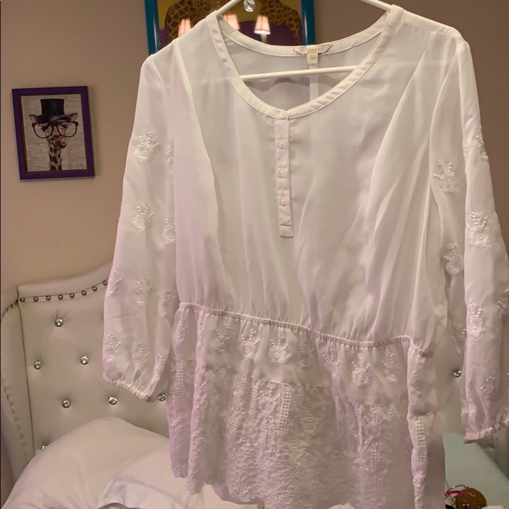 A women’s white shirt.